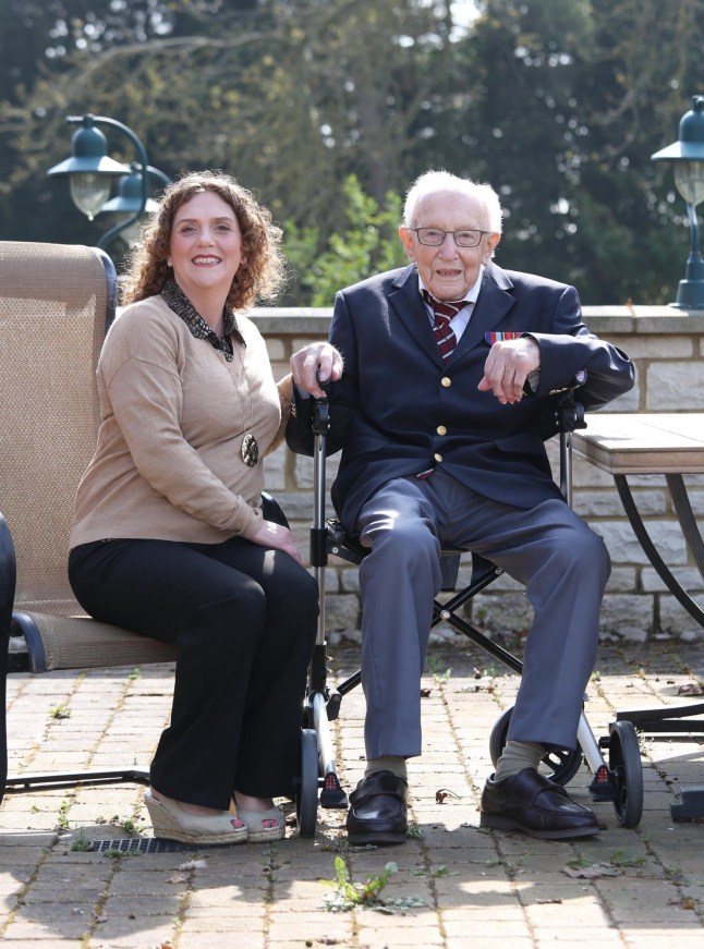 99 year old retired British Army Captain Tom Moore photographed in the garden of his home near Milton Keynes with daughter Hannah Ingram-Moore. Tom has raised over ?12 Million for the NHS by attempting to walk the length of his garden 100 times before his 100th birthday this month. Captain Tom Moore photoshoot, Milton Keynes, UK - 16 Apr 2020 Mandatory Credit: Photo by John Lawrence/REX/Shutterstock (10628395c)