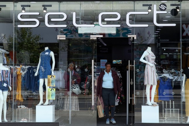 May 10, 2019 - London, UK, United Kingdom - A shopper is seen exiting from Select fashion chain store in north London. Select enters into administration, putting 1,800 jobs at risk. There are 169 Select stores across the UK and is owned by Turkish entrepreneur Cafer Mahiroglu. (Credit Image: ? Dinendra Haria/SOPA Images via ZUMA Wire)