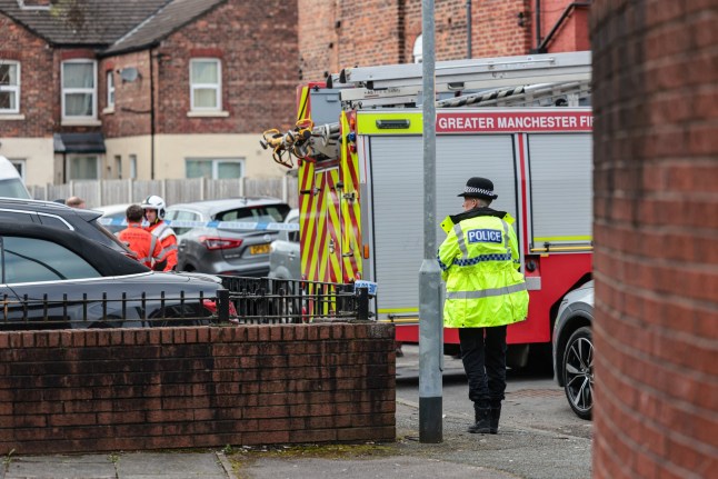 Police and GMFRS attend the scene of a house fire on Gateshead Close, Moss side in which a 4yr old girl has died.