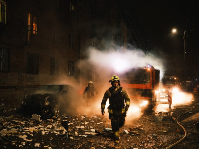 KHARKIV, UKRAINE - MARCH 02: Firefighters continue to extinguish the fire on the fifth floor of a residential building following the Russian Shahed drone attack on Kharkiv, Ukraine on March 02, 2025. Seven people sought medical help after the attack. (Photo by George Ivanchenko/Anadolu via Getty Images)