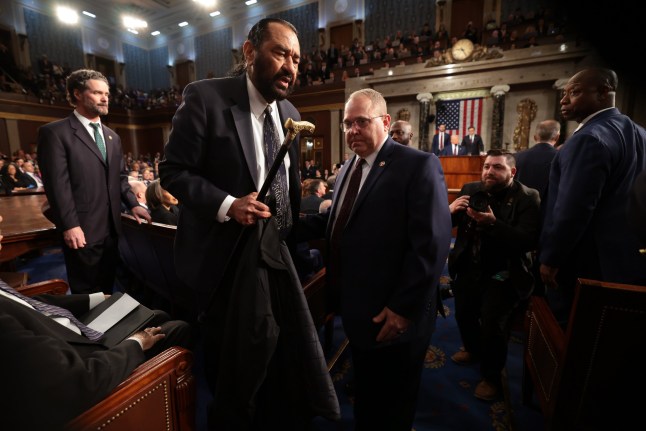 WASHINGTON, DC - MARCH 04: U.S. Rep. Al Green (D-TX) is removed from the chamber as President Donald Trump addresses a joint session of Congress at the U.S. Capitol on March 04, 2025 in Washington, DC. President Trump was expected to address Congress on his early achievements of his presidency and his upcoming legislative agenda. (Photo by Win McNamee/Getty Images)