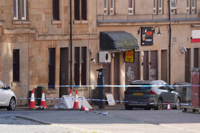 The scene on Clarendon Street, Glasgow, after 15-year-old boy died after being found seriously injured in the street. Police were called to the area at around 10.30pm on Wednesday to reports of a person found injured. Emergency services attended but the 15-year-old was pronounced dead at the scene. Police say they are treating the death as suspicious and have launched an investigation. Picture date: Thursday March 6, 2025. PA Photo. See PA story POLICE Boy. Photo credit should read: Jane Barlow/PA Wire