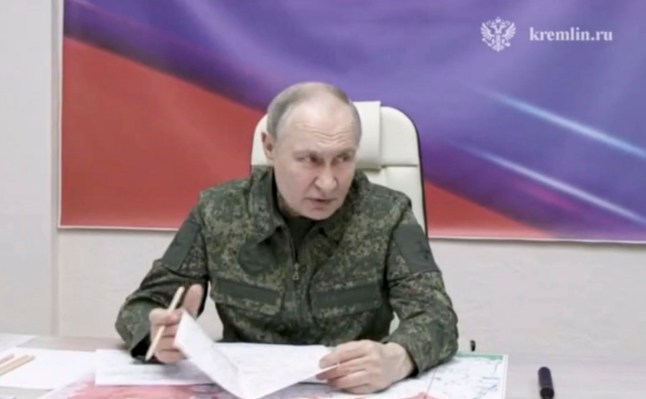 Putin appears in a military outfit in Kursk region on Kremlin TV.