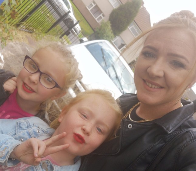 PIC FROM Kennedy News and Media (PIC SHOWS: KIM MOORE, 35, WITH HER TWO DAUGHTERS L-R MARNIE MOORE, 9, AND ORLA MOORE, 11) A mum claims her tot went 'floppy and unconscious' minutes after gulping a slushy - now she believes children under 12 should be banned from having the 'poisonous' iced drink. Kim Moore, from Burnley, Lancashire, faced every parent's worst nightmare when her four-year-old daughter Marnie suddenly went 'pale and unresponsive' at a children's party. The 35-year-old had bought her and older sister Orla a refillable slushy but 10 minutes later Marnie fell unconscious. DISCLAIMER: While Kennedy News and Media uses its best endeavours to establish the copyright and authenticity of all pictures supplied, it accepts no liability for any damage, loss or legal action caused by the use of images supplied and the publication of images is solely at your discretion. SEE KENNEDY NEWS COPY - 0161 697 4266