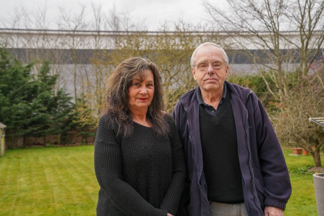 EAST ANGLIA NEWS SERVICE, tel 07767 413379 Wendy and Greg Pulham who are furious about the new warehouse built at the back of their garden in Nacton, Suffolk