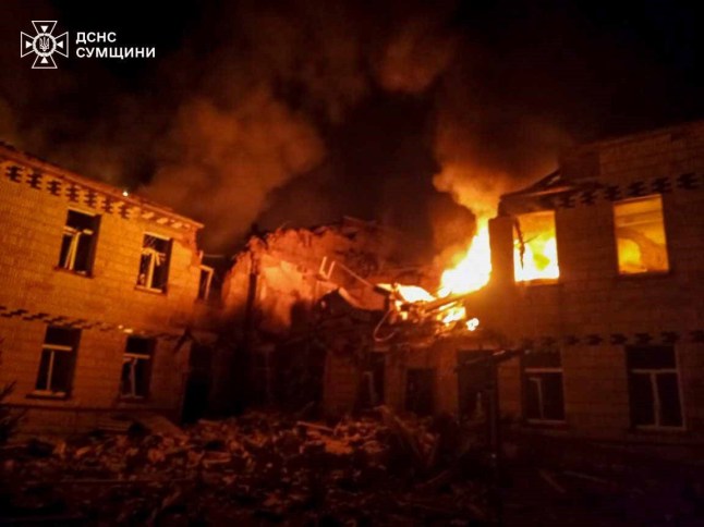 SUMY, UKRAINE - MARCH 19: (----EDITORIAL USE ONLY - MANDATORY CREDIT - 'UKRAINIAN STATE EMERGENCY SERVICE / HANDOUT' - NO MARKETING NO ADVERTISING CAMPAIGNS - DISTRIBUTED AS A SERVICE TO CLIENTS----) Officials work at the site of destruction and fire after the Russian attack in Sumy, Ukraine on March 19, 2025. Russian troops launched 7 strikes on a medical facility in the Krasnopil community. Two enemy drones attacked the building, causing a fire. (Photo by State Emergency Service of Ukraine/Anadolu via Getty Images)