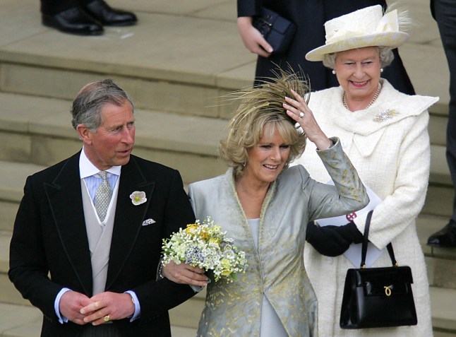Charles and Camilla, followed by Queen Elizabeth II, after the blessing ceremony at St George's Chapel.