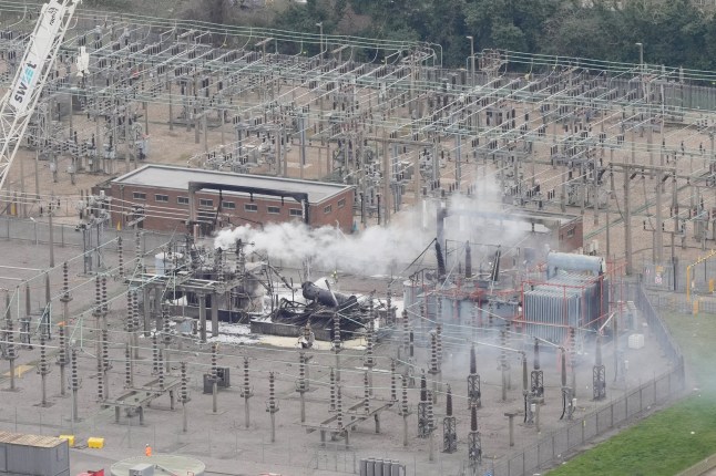 The North Hyde electrical substation which caught fire last night. More than 1,300 flights to and from Heathrow Airport will be disrupted on Friday due to the closure of the airport following the fire. Picture date: Friday March 21.