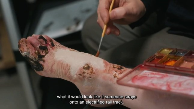 A screengrab showing a painted foot as part of the Network Rail stay off the track safety campaign.