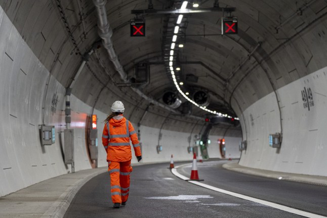 An engineer is doing final checks inside the Silvertown Tunnel on March 31 before the opening date.
