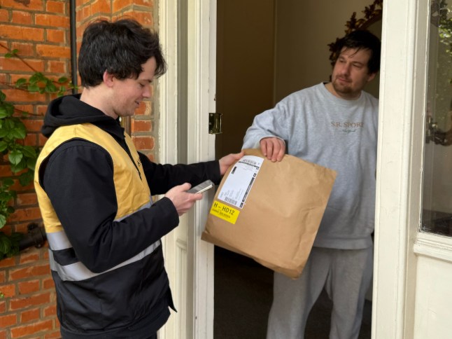 Driver Kevin Smith delivers parcel in Richmond.