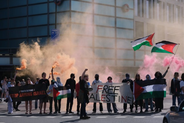 Mandatory Credit: Photo by Seiya Tanase/NurPhoto/Shutterstock (15250144g) Supporters of the pro-Palestine group 'Youth Demand' block a roundabout by Elephant and Castle Station in London, United Kingdom, on April 12, 2025, in protest of the UK government's sale of arms to Israel. Pro-Palestine Group Youth Demand Blocks Roundabout By Elephant And Castle Station In London, 12 April 2025, United Kingdom - 12 Apr 2025