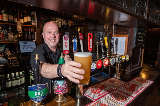 Tony Sommerville who runs The Market Porter, that opens Monday-Friday from 6am. Borough Market, London, April 2 2025. Release date April 13 2025. Welcome to the pub that serves London's earliest pint at 6am - given a special license for real-life Del Boys. The Market Porter in Borough Market opens 6am from Monday to Friday - and is busy serving drinks before most people are even out of bed. The pub's early morning hours are popular among night shift workers, such as nurses, police officers, and Tfl staff. But its landlord says it also caters to those who fancy a drink before a long day in the City. It was one of a select group of 'early houses' given a special license so it could offer drinks to market traders and vendors in Borough Market. The pub has been located in Stoney Street since the 1600s and became the Market Porter in 1890.