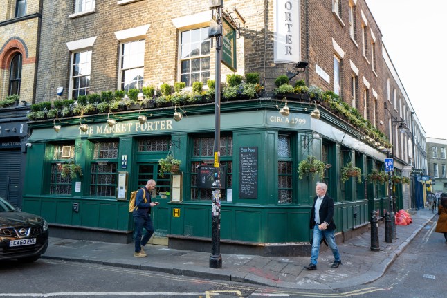 General views of The Market Porter, that opens Monday-Friday from 6am. Borough Market, London, April 2 2025. Release date April 13 2025. Welcome to the pub that serves London's earliest pint at 6am - given a special license for real-life Del Boys. The Market Porter in Borough Market opens 6am from Monday to Friday - and is busy serving drinks before most people are even out of bed. The pub's early morning hours are popular among night shift workers, such as nurses, police officers, and Tfl staff. But its landlord says it also caters to those who fancy a drink before a long day in the City. It was one of a select group of 'early houses' given a special license so it could offer drinks to market traders and vendors in Borough Market. The pub has been located in Stoney Street since the 1600s and became the Market Porter in 1890.