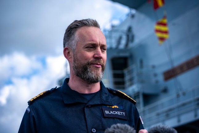EMBARGOED TO 0001 TUESDAY APRIL 22 Captain Will Blackett RN, Commanding Officer of HMS Prince of Wales onboard HMS Prince of Wales docked at HM Naval Base Portsmouth, as they prepare the carrier ahead of it deploying as part of the UK Carrier Strike Group to conduct interoperability training and defence engagement in the Indo-Pacific. Picture date: Wednesday April 16, 2025. PA Photo. See PA story DEFENCE Carrier. Photo credit should read: Ben Birchall/PA Wire