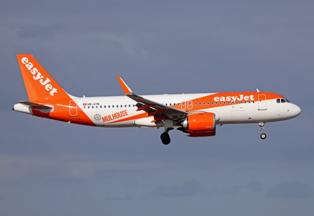 Mandatory Credit: Photo by Urbanandsport/NurPhoto/REX/Shutterstock (15224204e) An Airbus A320-251N from easyJet (Basel-Mulhouse Sticker) lands at Barcelona-El Prat airport in Barcelona, Spain, on January 17, 2025. Diverse aircraft landing in Barcelona, Spain - 17 Jan 2025