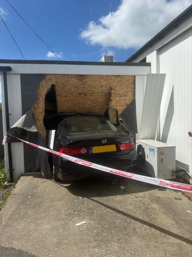 BNPS.co.uk (01202 558833) Pic: RiseMarket&Bakery/BNPS This is the terrifying moment a pensioner drove straight into a bakery after leaving a car wash. The elderly man pulled out of the Wash'N'Drive car wash in Bridport, Dorset, and accidentally ploughed through the side wall of the bakers at speed. The area of the building is the Rise Market & Bakery's alcohol store room.