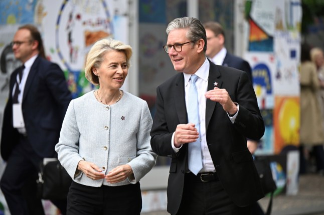 Ursula von der Leyen, President of the European Commission, left, and Keir Starmer, Prime Minister of the United Kingdom greet each other, ahead of their bilateral meeting at the 6th European Political Community summit Friday May 16, 2025 in Tirana, Albania. (Leon Neal/Pool via AP)
