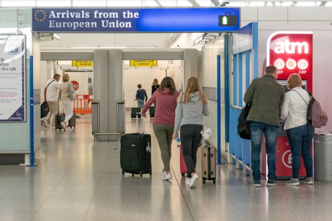 EU, UK, Borders, Passport and European Union signs and inscription in London Stansted STN airport in England, UK on 23 August 2019 a few months before the Brexit. (Photo by Nicolas Economou/NurPhoto via Getty Images)