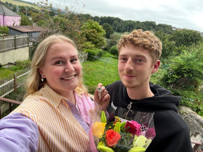 Millie and Brad pictured together with countryside in the background.
