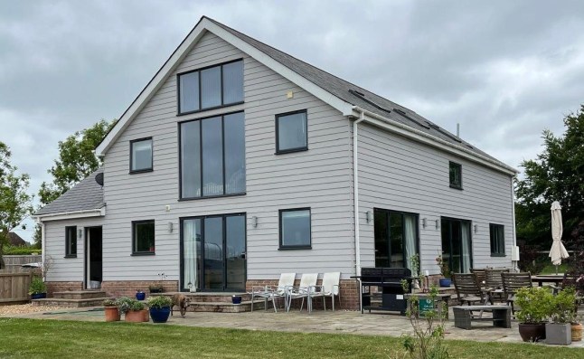 reference 14726935 Secret house. The pics show Jeremy Zielinski, 73, and wife Elaine, 79, at their ?1 million home in Great Abington, Cambridgeshire, which they have been ordered to tear down as they didn?t have permission to use the new build as a residence. The horses in the pics are Sandy (with red and blue ribbons over eyes) and Slick. supplied via Andrew Levy