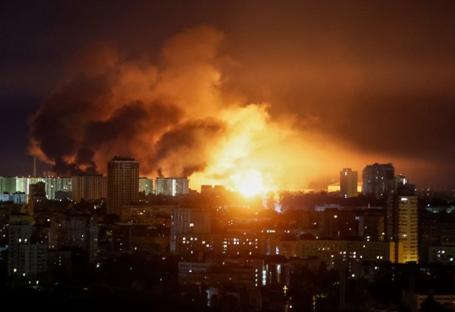 An explosion of a drone lights up the sky over the city during a Russian drone strike, amid Russia's attack on Ukraine, in Kyiv, Ukraine May 24, 2025. REUTERS/Gleb Garanich