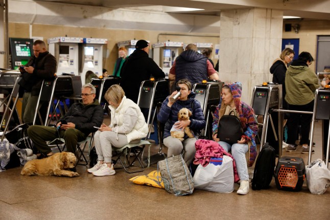 People take shelter inside a metro station during a Russian military strike, amid Russia's attack on Ukraine, in Kyiv, Ukraine, May 25, 2025. REUTERS/Alina Smutko TPX IMAGES OF THE DAY