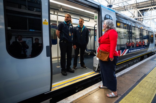 Transport Secretary Heidi Alexander (right) speaks to SWR train drivers ahead of boarding the first operational renationalised train service at Waterloo train station in central London, as South Western Railway (SWR) becomes the first rail operator to be renationalised under the Labour Government's Passenger Railway Services (Public Ownership) Act 2024. Picture date: Sunday May 25, 2025. PA Photo. See PA story RAIL Renationalisation. Photo credit should read: James Manning/PA Wire