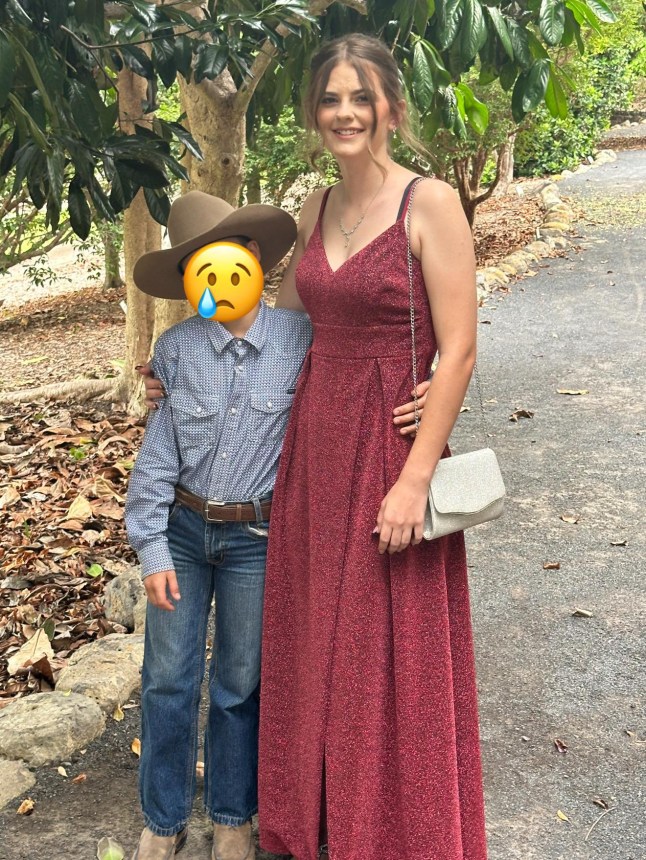 Pheobe Bishop in a dress with her younger brother.