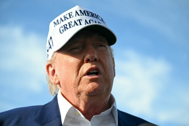 US President Donald Trump speaks to journalists before boarding Air Force One from Morristown Municipal Airport in Morristown, New Jersey, May 25, 2025, after spending the weekend in New Jersey. (Photo by SAUL LOEB / AFP) (Photo by SAUL LOEB/AFP via Getty Images)