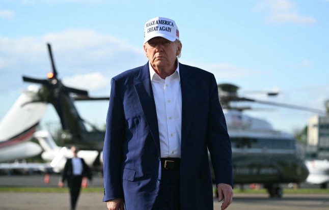 US President Donald Trump walks to speak to journalists before boarding Air Force One from Morristown Municipal Airport in Morristown, New Jersey, May 25, 2025, after spending the weekend in New Jersey. (Photo by SAUL LOEB / AFP) (Photo by SAUL LOEB/AFP via Getty Images)