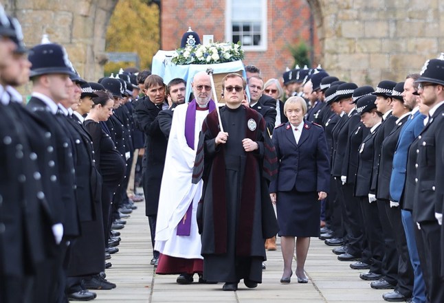 Handout photo issued by Nottinghamshire Police of police officers carrying the coffin during the funeral of Sergeant Graham Saville, who died aged 46 on August 29 after being hit by a train in Balderton, near Newark-on-Trent, while helping to save a man in distress, at Southwell Minster, on Monday. Picture date: Tuesday October 24, 2023. PA Photo. See PA story FUNERAL Balderton. Photo credit should read: Nottinghamshire Police /PA Wire