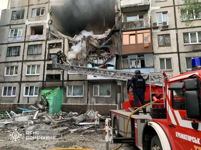 BELOZERSK, UKRAINE - MAY 30: (----EDITORIAL USE ONLY - MANDATORY CREDIT - 'UKRAINIAN STATE EMERGENCY SERVICE / HANDOUT' - NO MARKETING NO ADVERTISING CAMPAIGNS - DISTRIBUTED AS A SERVICE TO CLIENTS----) Firefighters try to extinguish fire broke out after Russian UAV hits five-story residential building in Belozersk, Ukraine on May 30, 2025. Apartments on the third to fifth floors partially destroyed. It is estimated that two more people may be trapped under the rubble. Emergency rescue and search operations are ongoing. (Photo by State Emergency Service of Ukraine/Anadolu via Getty Images)