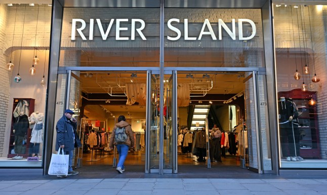 LONDON, ENGLAND - JANUARY 09: People walk past a River Island fashion retail store in Oxford Street on January 09, 2025 in London, England. (Photo by John Keeble/Getty Images)