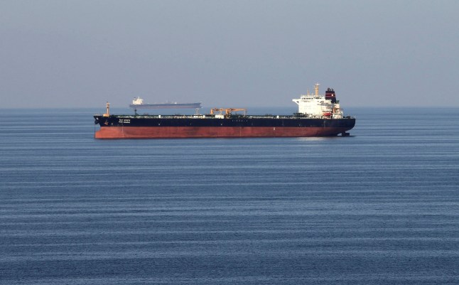 An oil tanker passes throug the Strait of Hormuz.