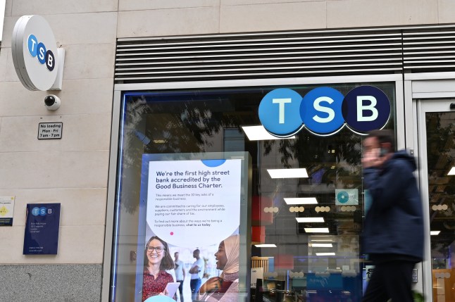 LONDON, ENGLAND - OCTOBER 14: People walk past a branch of a TSB bank in Cheapside on October 14, 2024 in London, United Kingdom. (Photo by John Keeble/Getty Images)