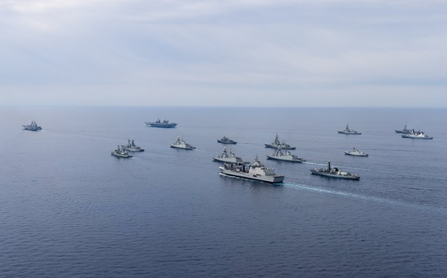 Pictured: NATO ships participating in Exercise Med Strike form up for a group photograph as Exercise Med Strike comes to an end, May 2025. The UK and Italian navies have put on a huge show of force. As two of Europe???s most powerful task forces, they teamed up for a week-long exercise as the Royal Navy???s headline global mission reaches its high point in the Mediterranean. The Italian carrier strike group ??? centred on their flagship ITS Cavour ??? combined with that of Portsmouth-based HMS Prince of Wales as a force of some 21 warships, three submarines, 41 fast jets, 19 helicopters, ten patrol aircraft and 8,000 personnel operated in the Ionian Sea.