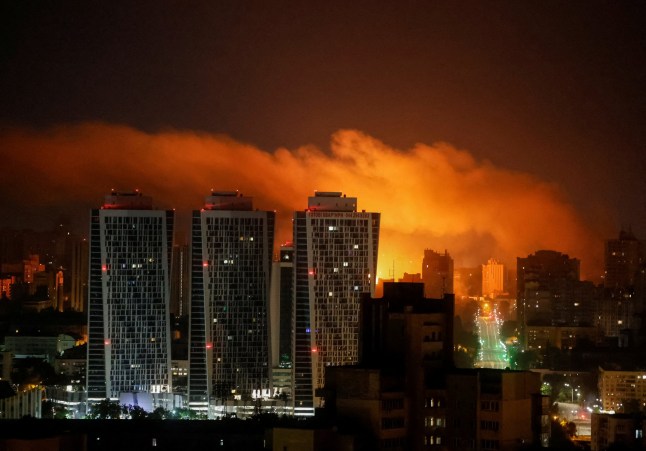An explosion of a drone lights up the sky over the city during a Russian drone and missile strike, amid Russia's attack on Ukraine, in Kyiv, Ukraine July 10, 2025. REUTERS/Gleb Garanich TPX IMAGES OF THE DAY