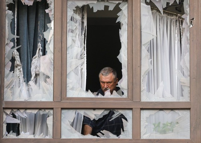 epaselect epa12250590 A local man reacts at the site of a drone strike on a residential building in Kyiv, Ukraine, 21 July 2025, amid the Russian invasion. At least two people died and 15 people were injured after Russian forces launched an overnight large-scale combined attack with at least 24 missiles and 426 drones across Ukraine, the State Emergency Service (SES) of Ukraine reported. EPA/SERGEY DOLZHENKO