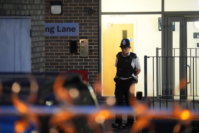Police officers at the scene in Long Lane, Southwark, south London, where four people were stabbed earlier today. A 58-year-old man died at the scene while three other men were taken to hospital, where one aged 27 has since died. Picture date: Monday July 28, 2025. PA Photo. Photo credit should read: James Manning/PA Wire