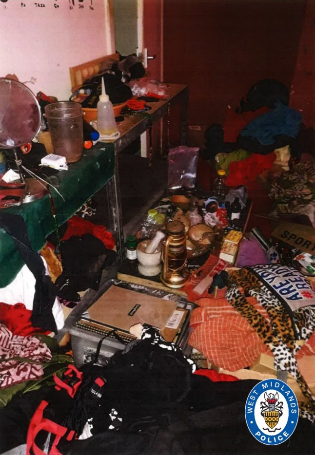 A photograph of the conditions of the couple's home, showing many objects covering surfaces and in disarray.