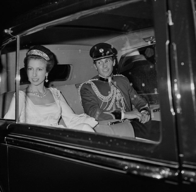Princess Anne sitting with husband Captain Mark Phillips in a car, 1974. (Photo by Daily Express/Hulton Archive/Getty Images)