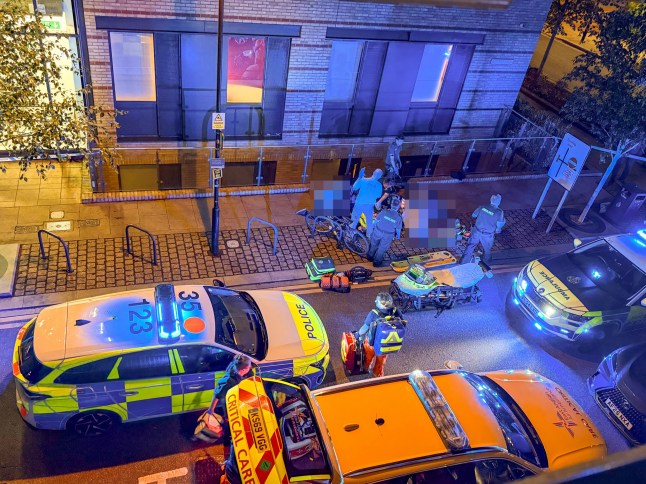 Police at the scene in Cambridge where a man in his 20s was murdered on Friday evening.