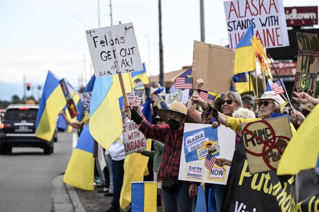 ANCHORAGE, ALASKA AUGUST 15: Ukraine supporters gather in a demonstration ahead of the meeting between U.S. President Donald Trump and Russian President Vladimir Putin in Anchorage, Alaska, waving flags and holding signs in solidarity with Ukraine, on August 15, 2025. (Photo by Fatih Aktas/Anadolu via Getty Images)