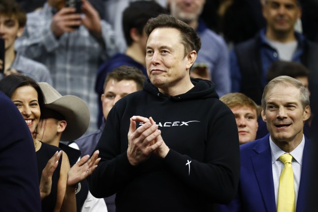 PHILADELPHIA, PENNSYLVANIA - MARCH 22: Senior advisor Elon Musk claps as U.S. President Donald Trump enters the stadium during the Division I Men's Wrestling Championship held at the Wells Fargo Center on March 22, 2025 in Philadelphia, Pennsylvania. (Photo by Isaac Wasserman/NCAA Photos via Getty Images)