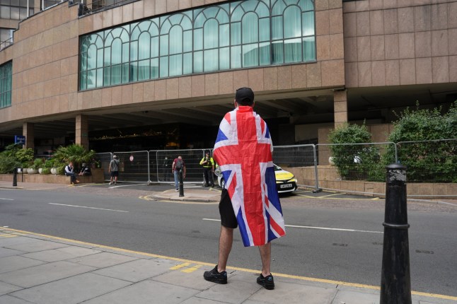 People demonstrating under the Abolish Asylum System slogan outside the Britannia International Hotel in Canary Wharf, London. Picture date: Sunday August 24, 2025. PA Photo. Photo credit should read: Yui Mok/PA Wire