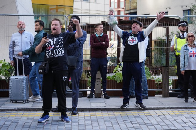 People protest outside the Britannia International Hotel in Canary Wharf, east London. Picture date: Sunday August 31, 2025. PA Photo. Photo credit should read: Lucy North/PA Wire