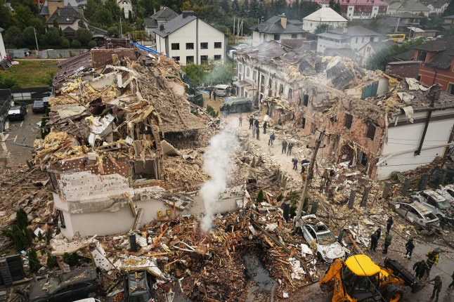 Rescuers work at the site of an apartment buildings damaged during a Russian attack in Kyiv, Ukraine, Sunday, Sept. 28, 2025. (AP Photo/Efrem Lukatsky) (Credits: AP)