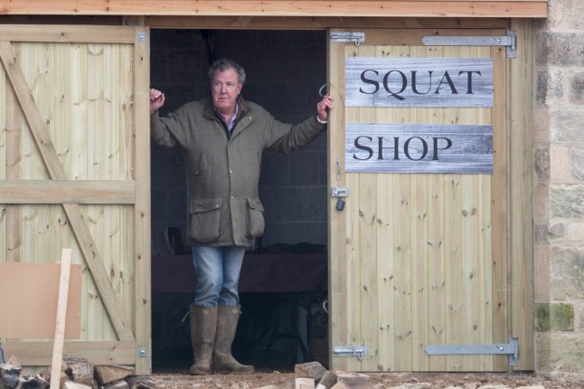 FILE PICTURE - Jeremy Clarkson outside his Diddly Squat farm shop in Chipping Norton, Oxfordshire. 22 February 2020. See SWNS story SWLNclarkson. Jeremy Clarkson has reportedly told the council he no longer wants to open a restaurant at his Diddly Squat Farm ? claiming to have been ?thwarted? by an enforcement notice. The former Top Gear broadcaster was ordered by West Oxfordshire District Council to shut a pizza caf? he had been running at his Chadlington farm shop. Officials claimed it breached planning laws and was having a 'significant impact' on the community. The farm, which starred in Amazon hit series Clarkson?s Farm, has been criticised by some villagers concerned about an influx of visitors parking on verges. Council officers issued an enforcement notice ordering him to remove ?dining-related materials? at the farm, although the TV star announced he would appeal the order. But now, the broadcaster is said to have admitted defeat.
