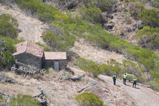 Members of a search and rescue team search near the last known location of Jay Slater, near to the village of Masca, Tenerife, where the search for missing British teenager Jay Slater, 19, from Oswaldtwistle, Lancashire, continues.?Picture date: Sunday June 23, 2024. PA Photo. Mr Slater was last heard from on Monday morning whilst attempting to walk back to his accommodation when he missed a bus, after staying with people he met at the NRG music festival in Tenerife, Spain's Canary Islands. See PA story POLICE Tenerife. Photo credit should read: James Manning/PA Wire